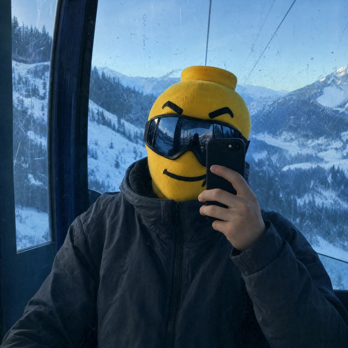 Gondola mirror selfie wearing a Balakoo ski mask